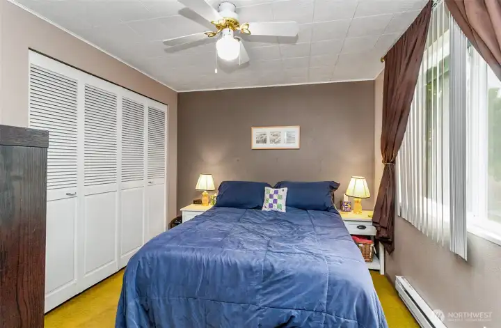 Closets line the wall of the Primary Bedroom