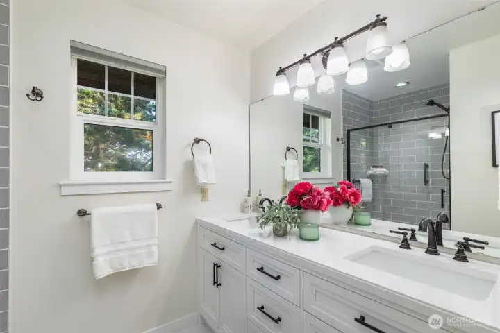 Lovely renovated primary bathroom, light and bright.