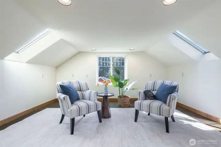 Space to read, write, play cards, or a perfect playroom for kiddos, this third floor bonus rooms avails a multitude of possibilities.