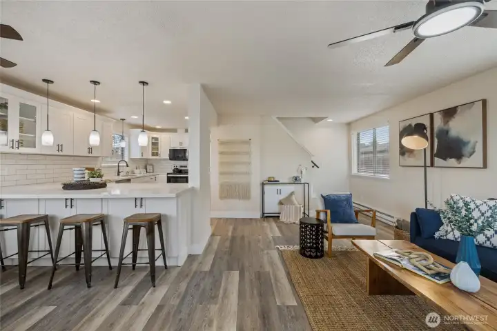 Welcoming living & dining rooms with open concept kitchen. New LVP flooring throughout.