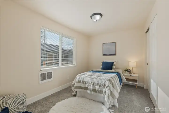 Bedroom #1 on main floor with ample closet & space & new carpet