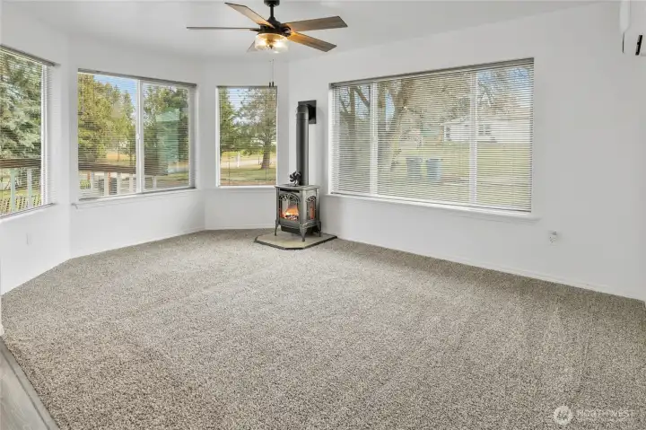 Lots of windows for natural light and the gas fireplace to enjoy.