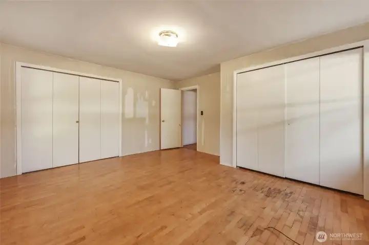 Primary suite offers a generous closet and surprise en suite bath.