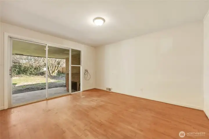 Third bedroom connects the home to the covered patio out back.