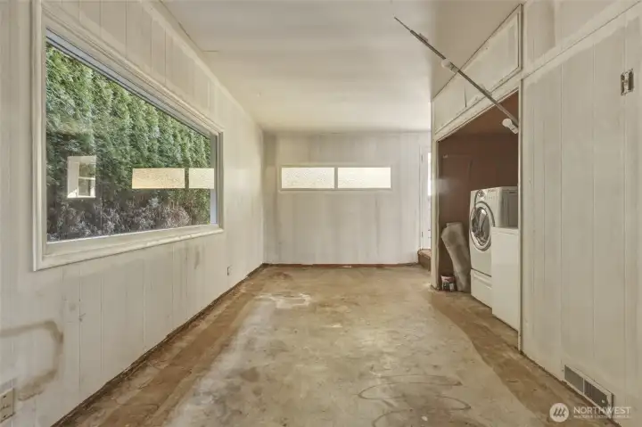 Go deep and create another living room space or embrace the utilitarian space for a workshop.