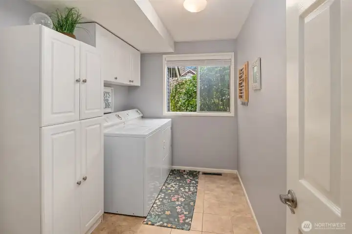 Main floor laundry that leads to the 2 car garage