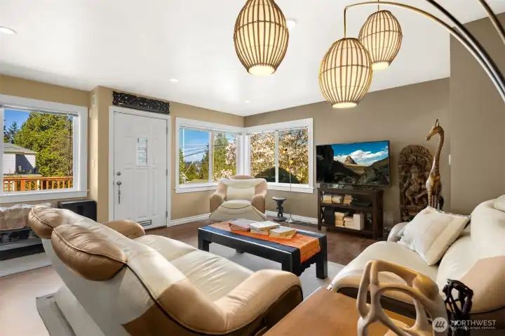 Big, new windows bring in so much light and the surrounding beauty and Lake Washington peek-a-boo views.