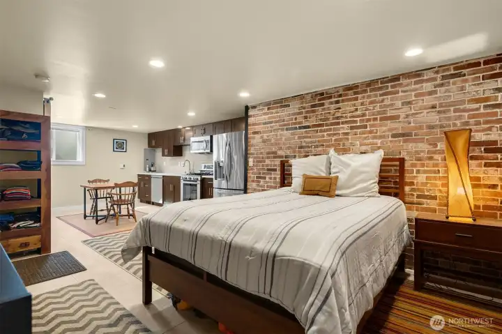 Lower MIL currently set up as a studio with high-end finishes & spacious kitchen.