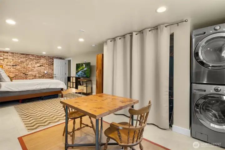 Good ceiling height and completely private makes this mother-in-law suite is perfect for multi-generational living.  The lower unit enjoys its own washer and dryer, heating system, big kitchen, and modern bathroom.