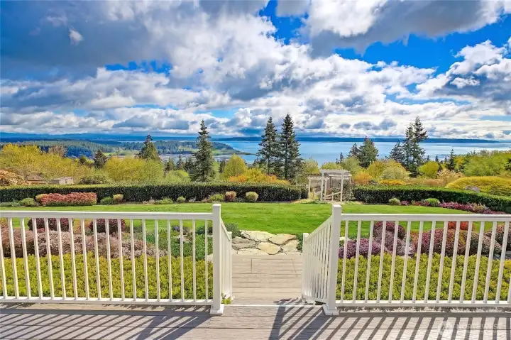 Welcome Home to "Green Isle Manor", a residence where arrival feels like a return to something quietly timeless.