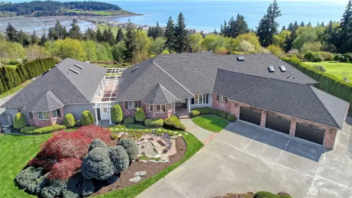 Welcome Home to "Green Isle Manor", a residence where arrival feels like a return to something quietly timeless.