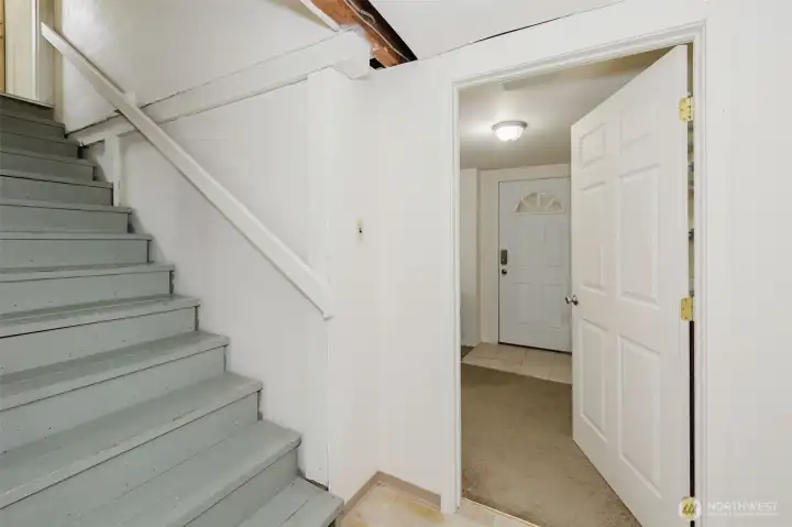 Stairs into basement living