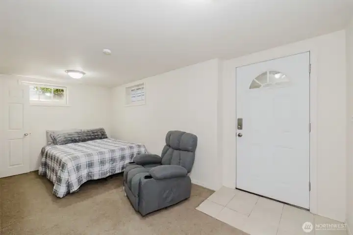 Extra finished room with exterior entrance/exit