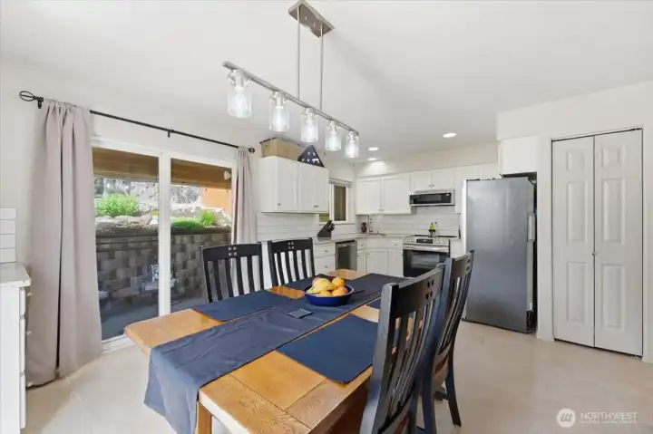 Slider to private covered patio area and  beautifully landscaped yard.