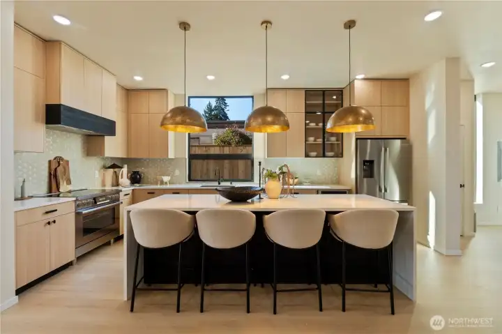 6 burner stove, stainless steel appliances and tons of storage and counter space