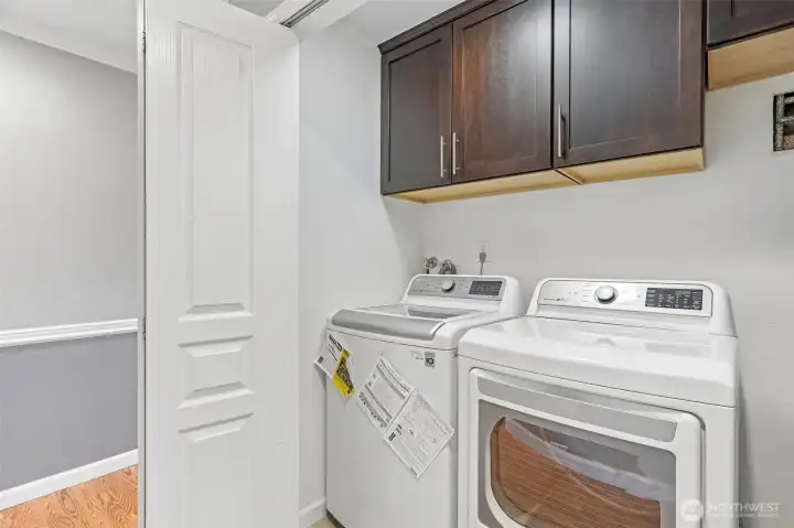 Convenient in-unit laundry with full-size washer and dryer included.