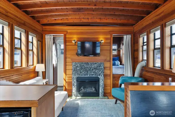 A fireplace, in a houseboat? Doesn't get much cozier. A fireplace, in a houseboat? Doesn't get much cozier.