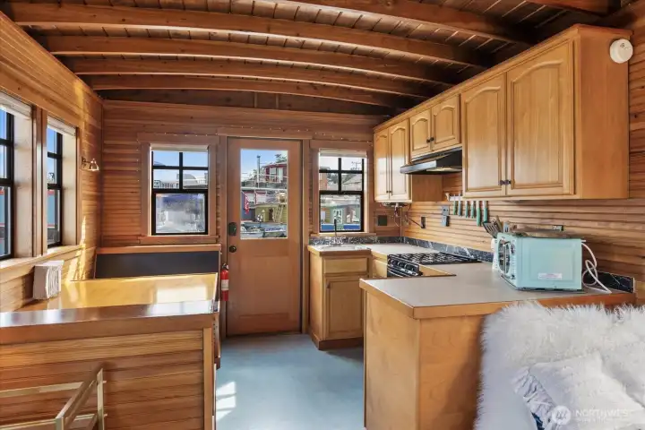 Open kitchen/living but also has separation. Open kitchen/living but also has separation.
