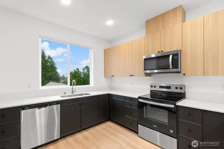 This unit features our bay interior color spec with black lower cabinets.
