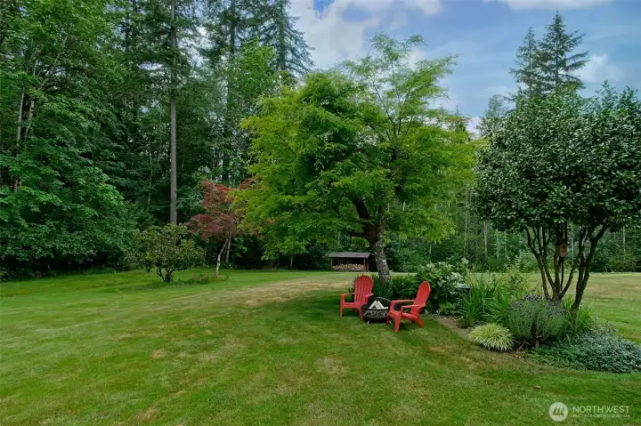 This gorgeous and private yard has SO much space for activities AND relaxation. This gorgeous and private yard has SO much space for activities AND relaxation.