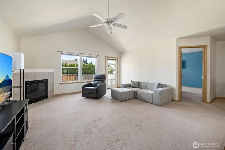 Huge living room with vaulted ceilings and cozy gas fireplace. Huge living room with vaulted ceilings and cozy gas fireplace.