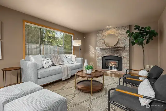 Cozy family room with heat efficient gas fireplace.