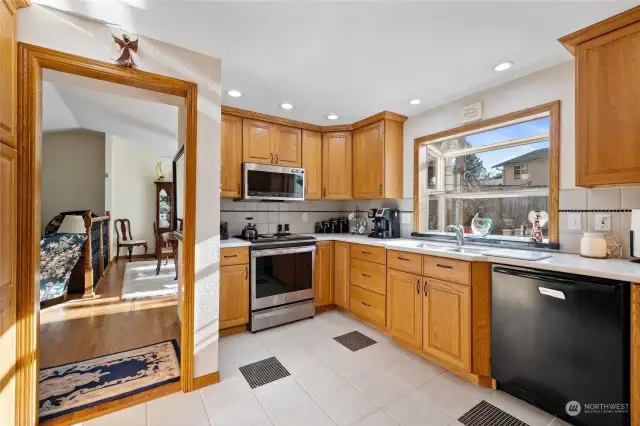 Welcome to this beautifully maintained West Campus home! Sunny eat in kitchen with induction stove.