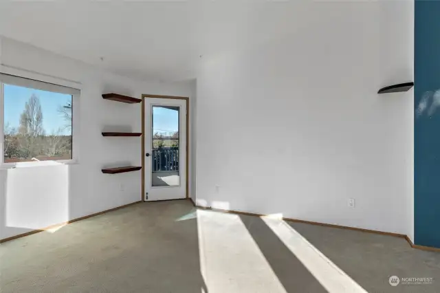 Living room has door to deck.