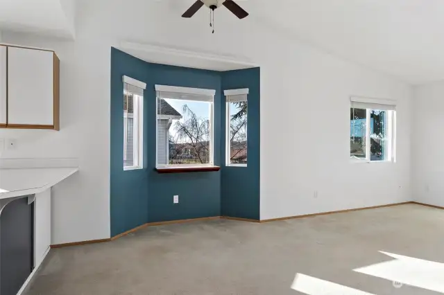 Dining area open to kitchen and living room.