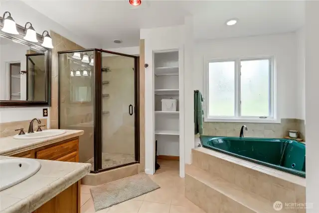 Primary en-suite, toilet has it's own room and there are 2 large walk in closets