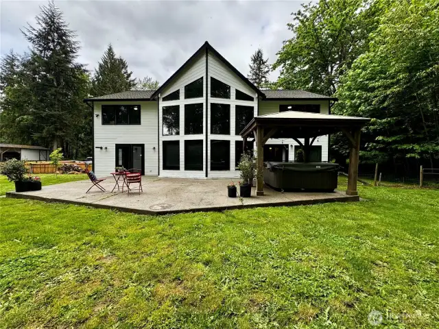 Back view of home, room for entertaining and relaxing