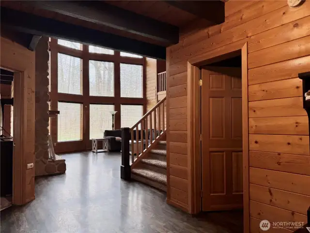 Front entry, 3/4 bath to right. All pine paneling is tongue and groove