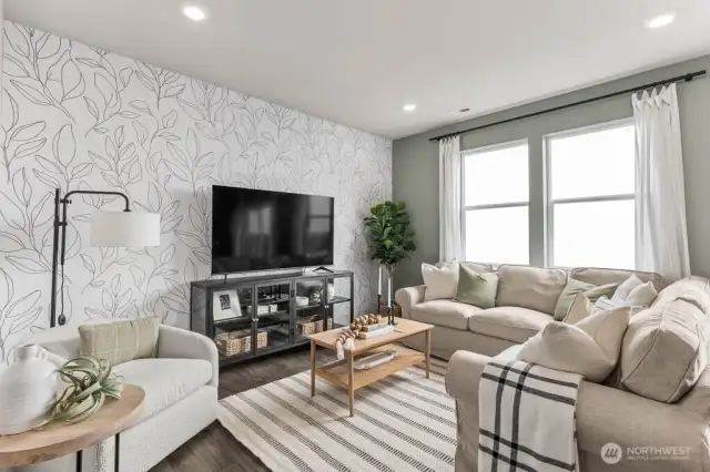 Enjoy reading or movies in the great room. Pictures are representative of Burnham floorplan. Colors and options will vary. Photos from Model Home on 30. Homesite 77 is a mirror image.