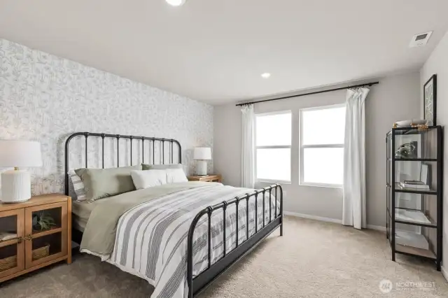Primary bedroom on upper level. Pictures are representative of Burnham floorplan. Colors and options will vary. Photos from Model Home on 30. Homesite 77 is a mirror image.