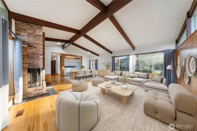 Great living area with vaulted ceilings, open beams and great floor to ceiling windows!