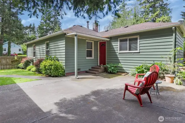 Sweet, fenced courtyard and garden. Back door enters into utility/mud room.