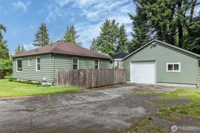 Garage is larger than one car. Plenty of storage in here with room for a shop if that is what you want.