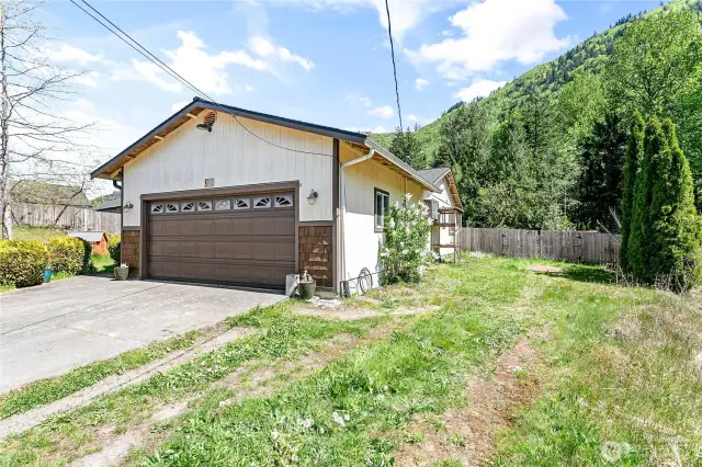In addition to a two-car garage, the property includes parking for an RV or boat. Catio included!