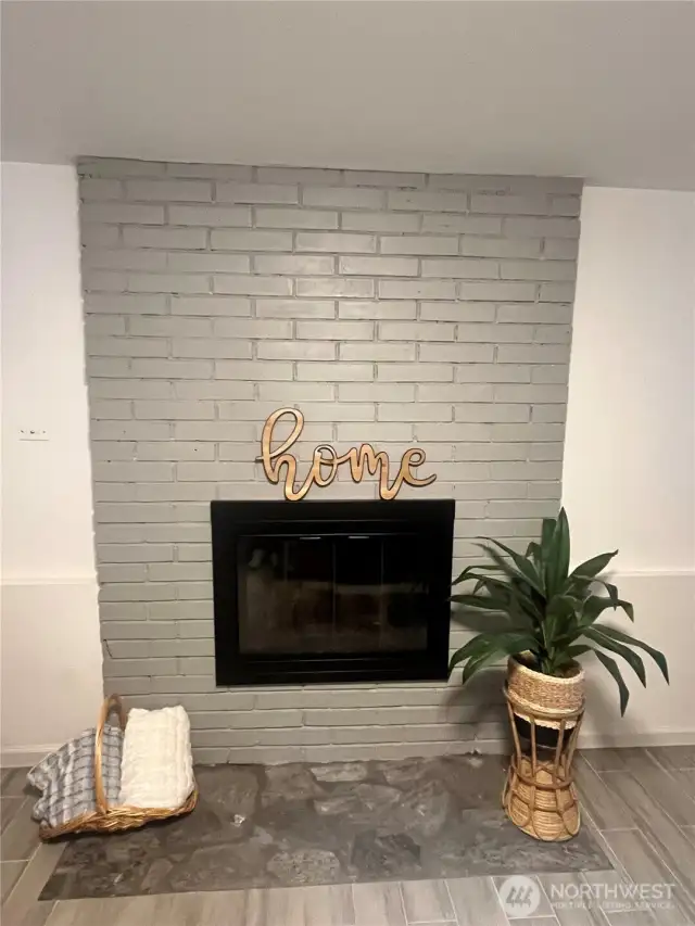 Updated fireplace in the rec room