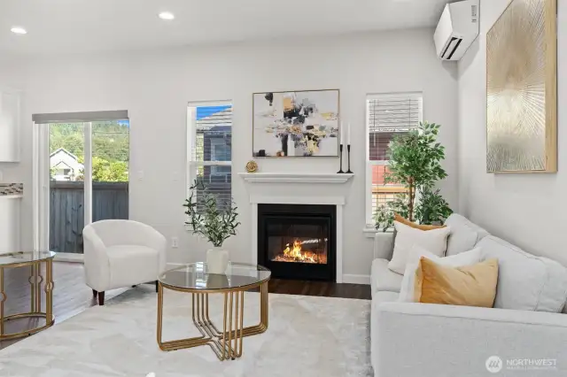 A cozy gas fireplace adds comfort and ambiance year-round.