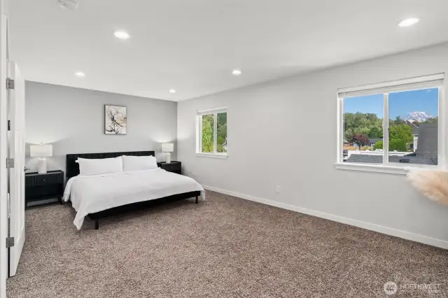 Enjoy a private escape with a walk-in closet, dual vanity bath, and stunning mountain vistas.