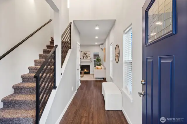 Crisp white walls and contemporary finishes set the tone in your entryway.