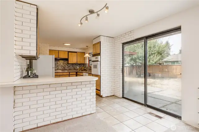 Breakfast bar and slider to the back patio