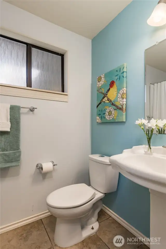 Full primary bath with tiled floor