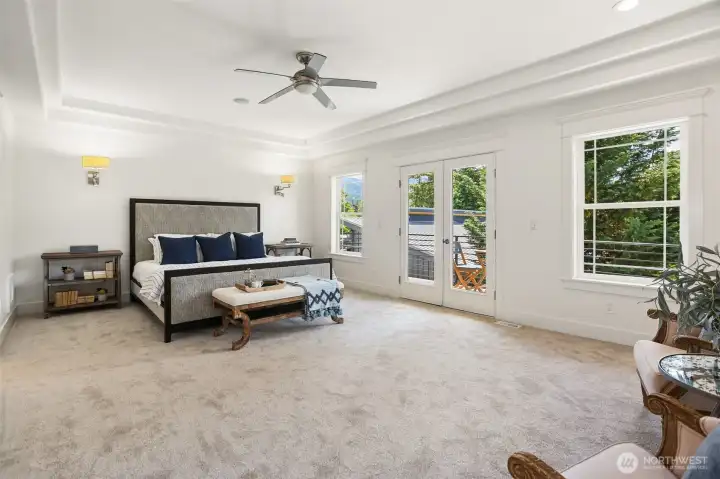 Huge primary bedroom on the 2nd floor with awesome views of the Issaquah Alps.