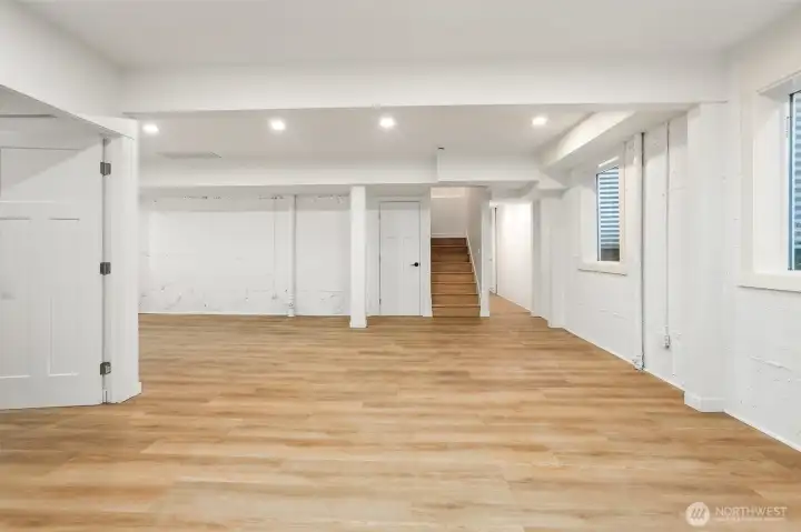 Open space could be a home gym, game room, home theatre, or where the guests come to stay.