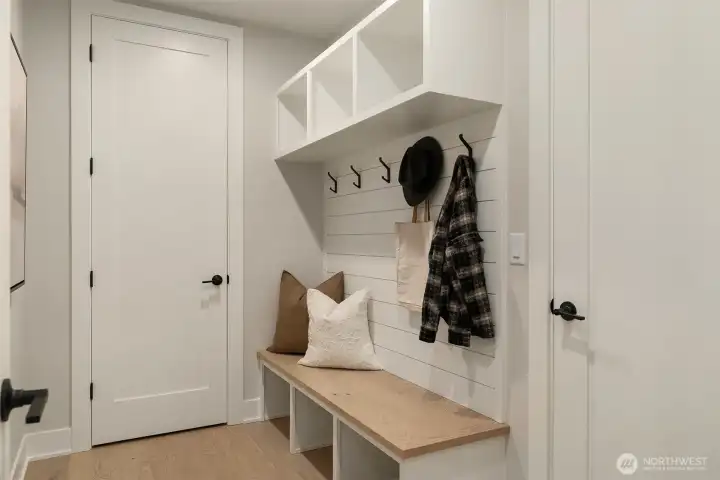 Mudroom with built-ins keeps daily life organized and clutter-free.
