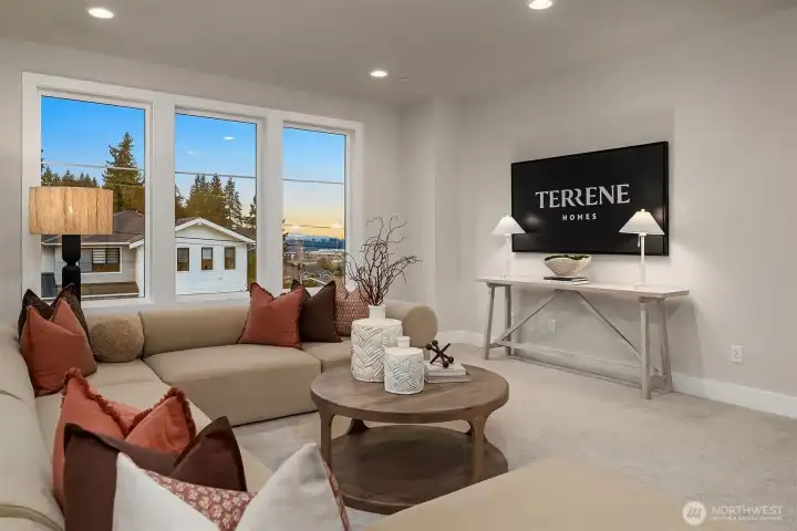 Upper-level living space ideal for media, play, or relaxation.