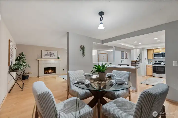 This thoughtfully placed dining space allows for easy access to both kitchen and living areas.
