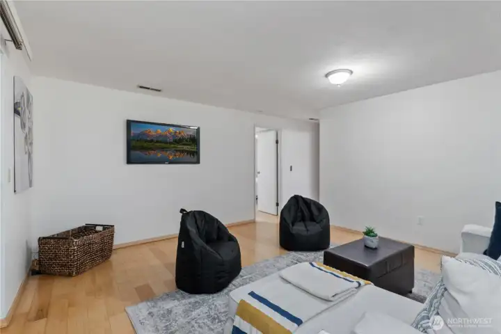 Heading downstairs you have a spacious second living space with room to unwind, entertain, or adapt to your lifestyle needs.